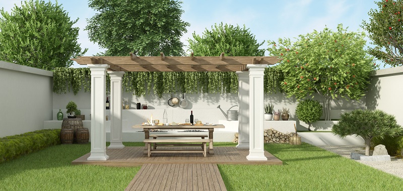 Lush,Garden,With,Table,Set,Under,A,Gazebo,And,Barbecue